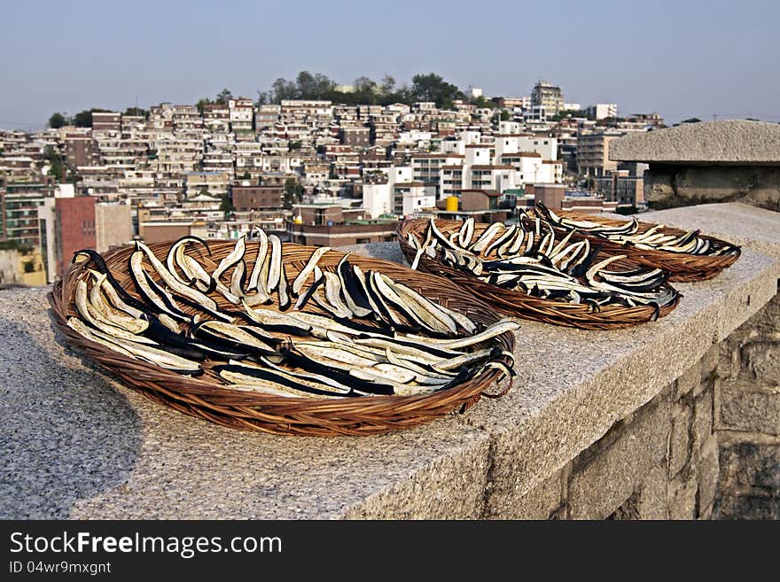 Sliced eggplants are dried under the sun