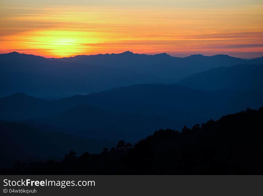 Sunset behind the mountain, thailand