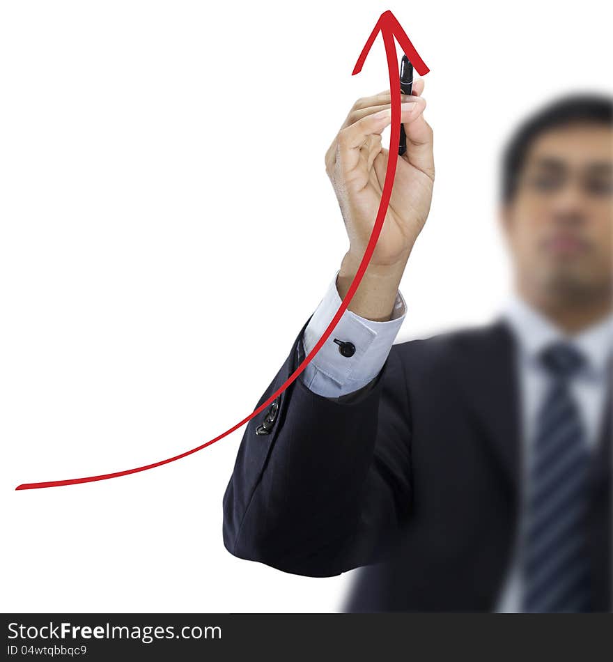 Businessman drawing red arrow