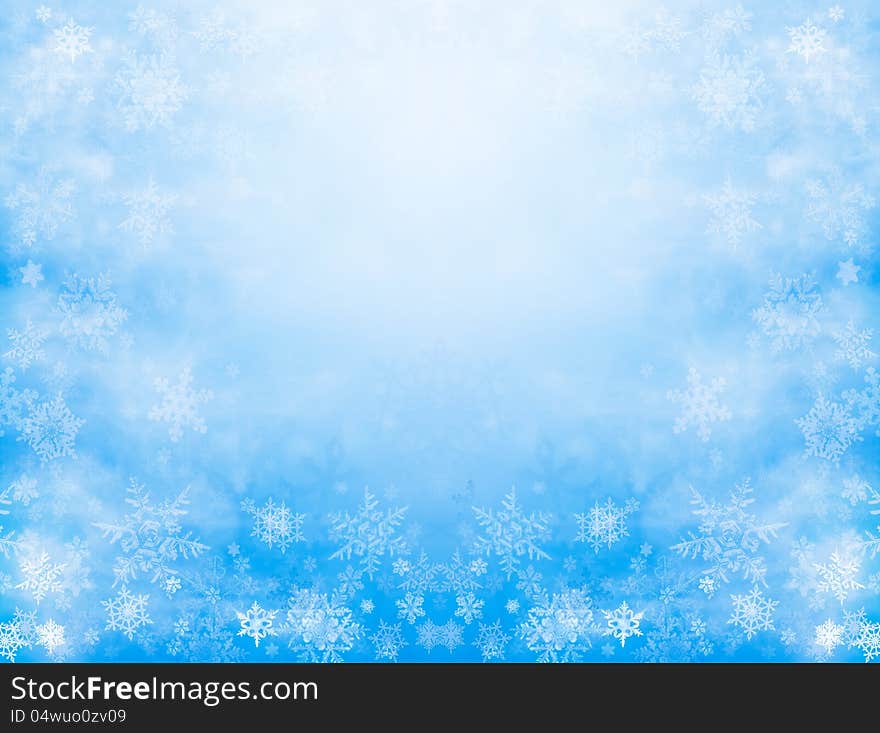 Sharp and diffuse snowflakes on a soft blue background with a mirrored kaleidoscope effect and glowing center. Sharp and diffuse snowflakes on a soft blue background with a mirrored kaleidoscope effect and glowing center.