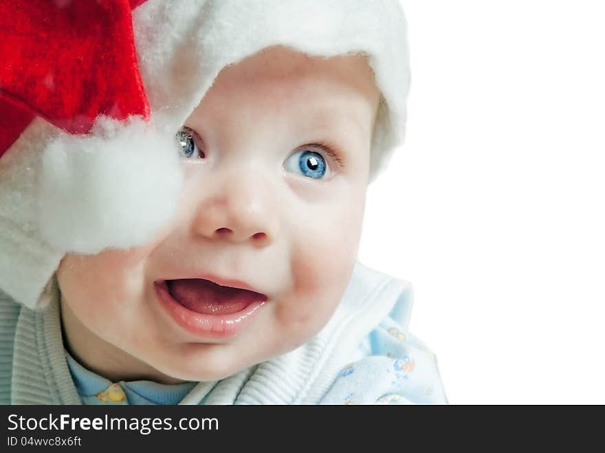 Portrait of a baby in a Christmas hat Sata Claus