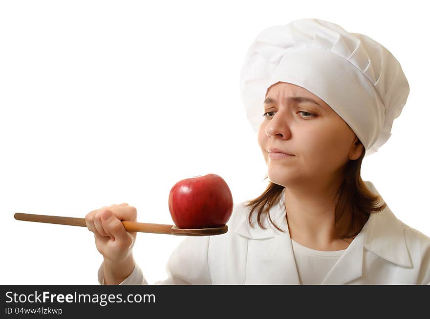 Chef with apple and wooden spoon