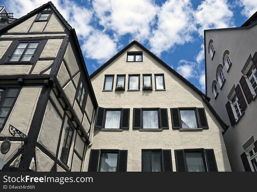 Traditional german houses in sober colors under blue sky. Traditional german houses in sober colors under blue sky