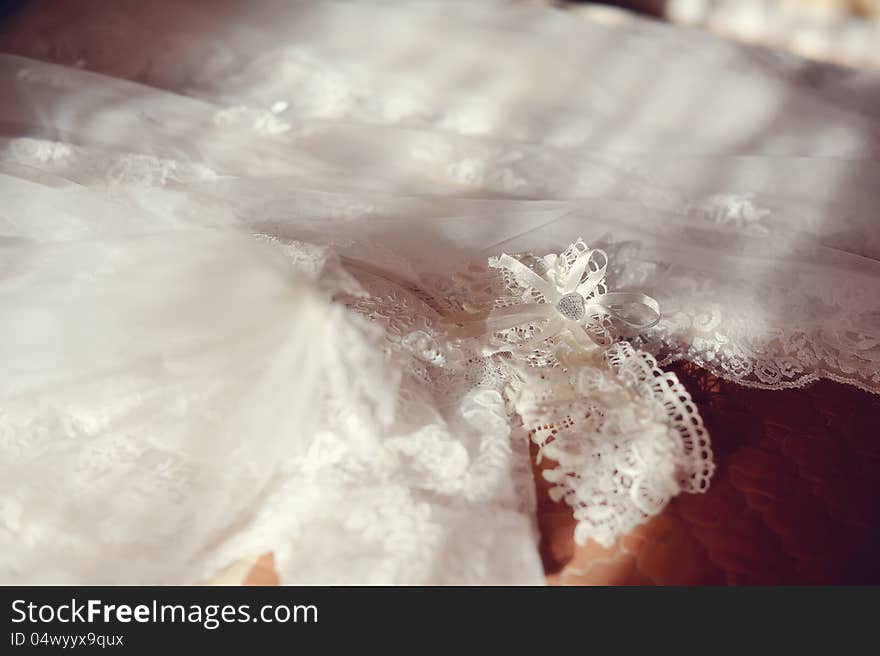 Beautiful cream wedding dress detail with flowers. Beautiful cream wedding dress detail with flowers
