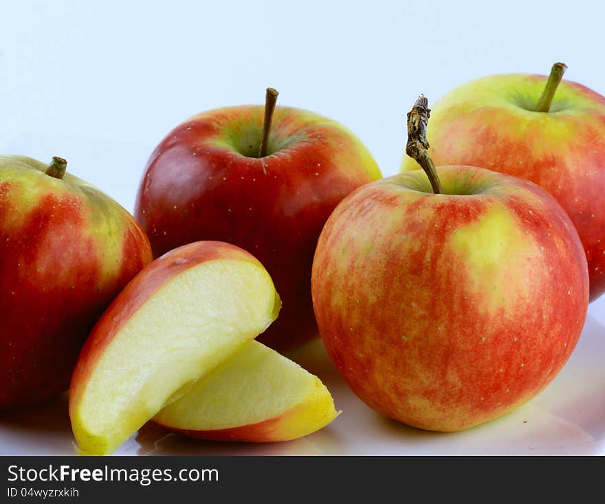 A couple of Dutch Elstar apples and a sliced apple