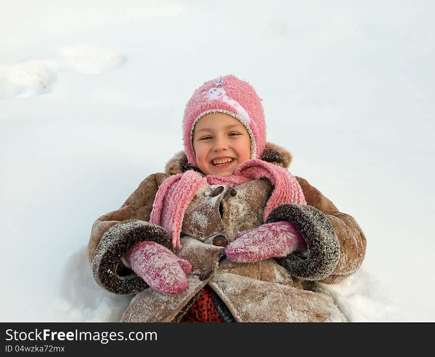 Girl in warm clothes outdoors