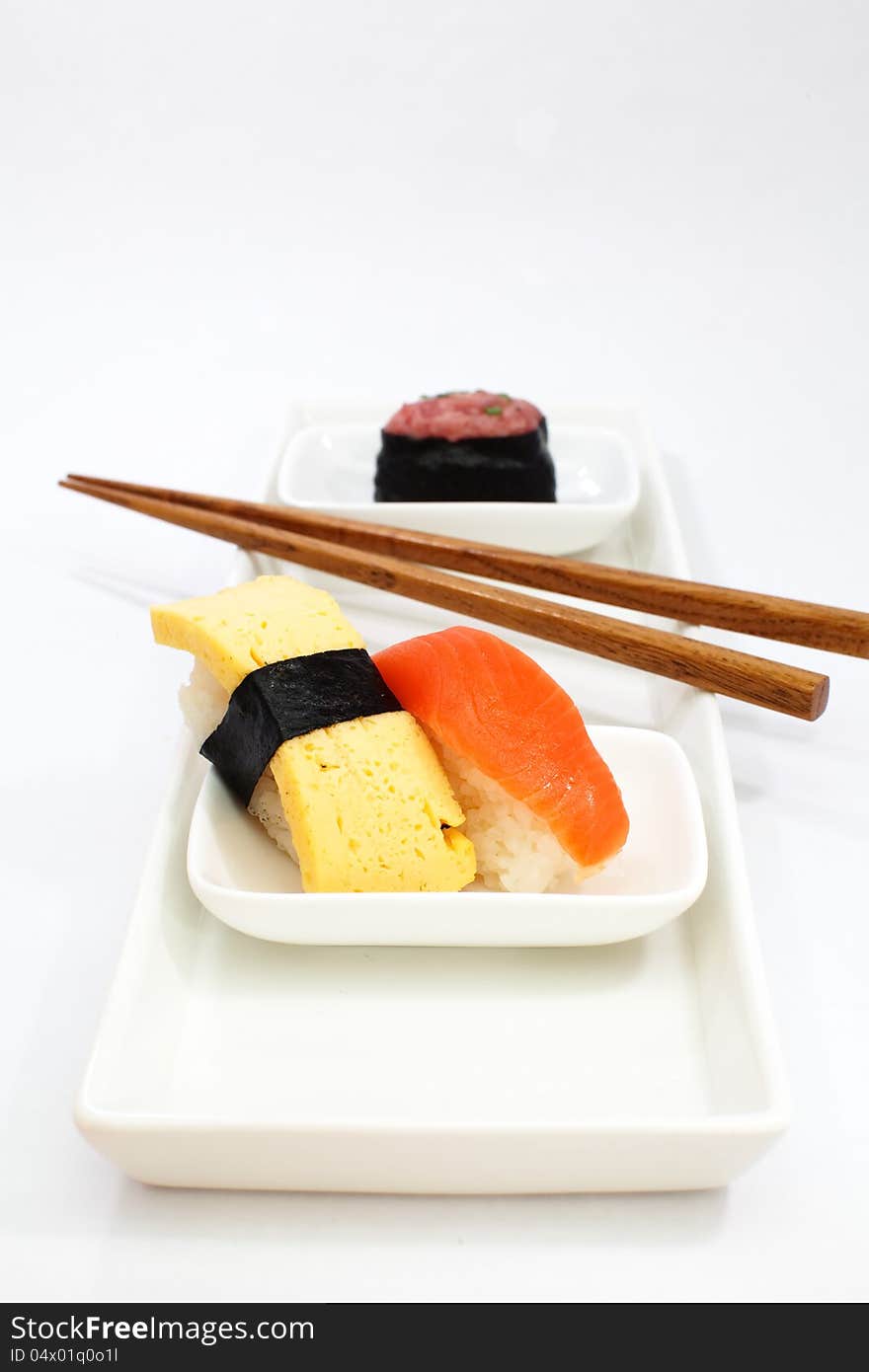 Sushi is Japanese food consisting of cooked vinegared rice combined with other ingredients usually raw fish or other seafood. Sushi is Japanese food consisting of cooked vinegared rice combined with other ingredients usually raw fish or other seafood.