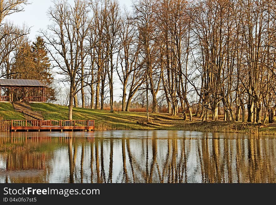 Landscape with pergola at the lake. Landscape with pergola at the lake.