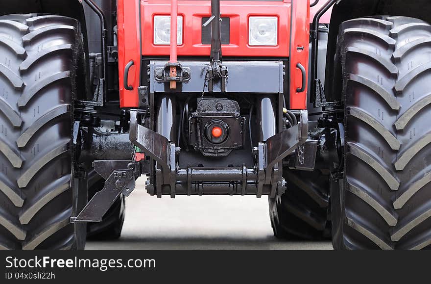 A close-up of a brand new modern tractor. A close-up of a brand new modern tractor