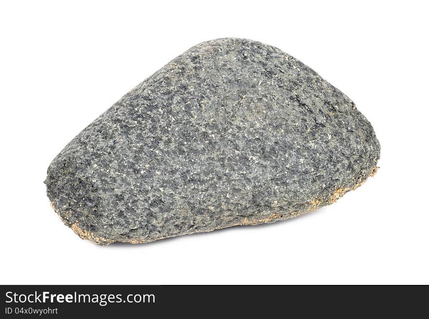 A gray stone isolated on a white background - horizontal orientation. A gray stone isolated on a white background - horizontal orientation