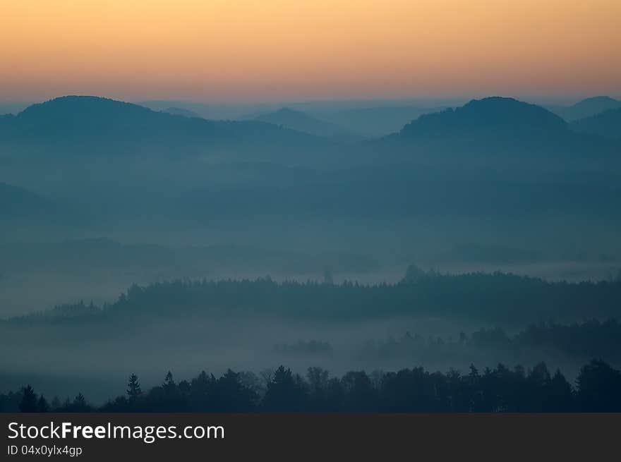 Hilly landscape with fog