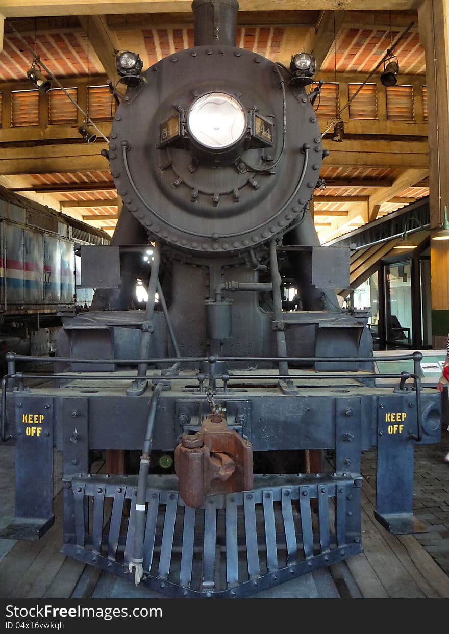 Close front view of a steam engine