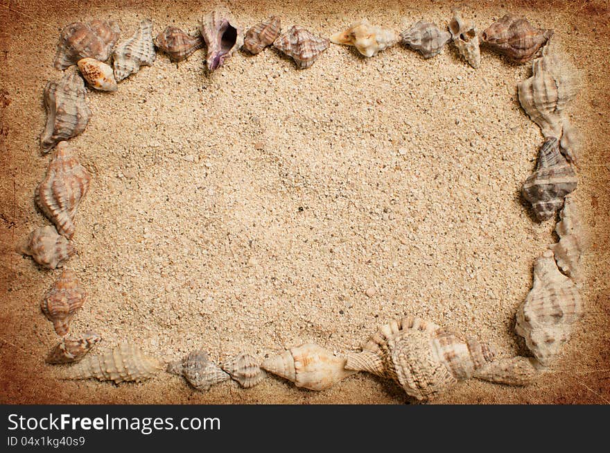 Frame made of seashells on the gold sand. Frame made of seashells on the gold sand