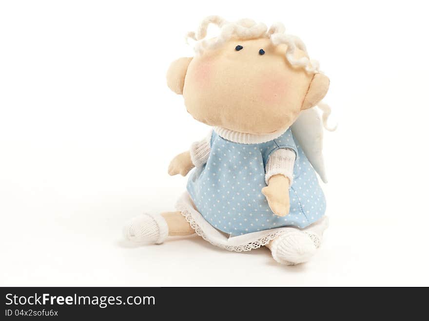 Handmade toy cute little angel boy isolated. Handmade toy cute little angel boy isolated