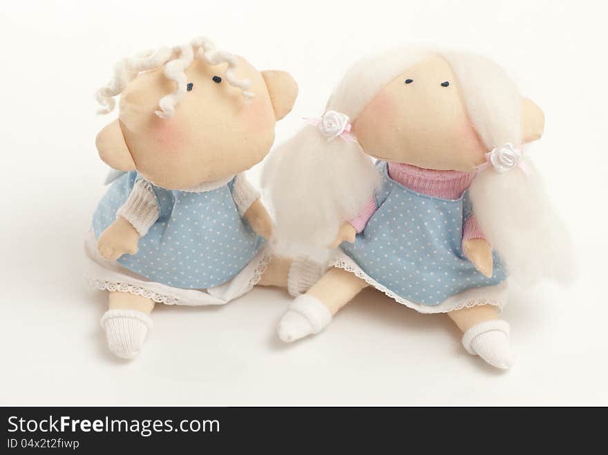 Handmade toys boy and girl on the white