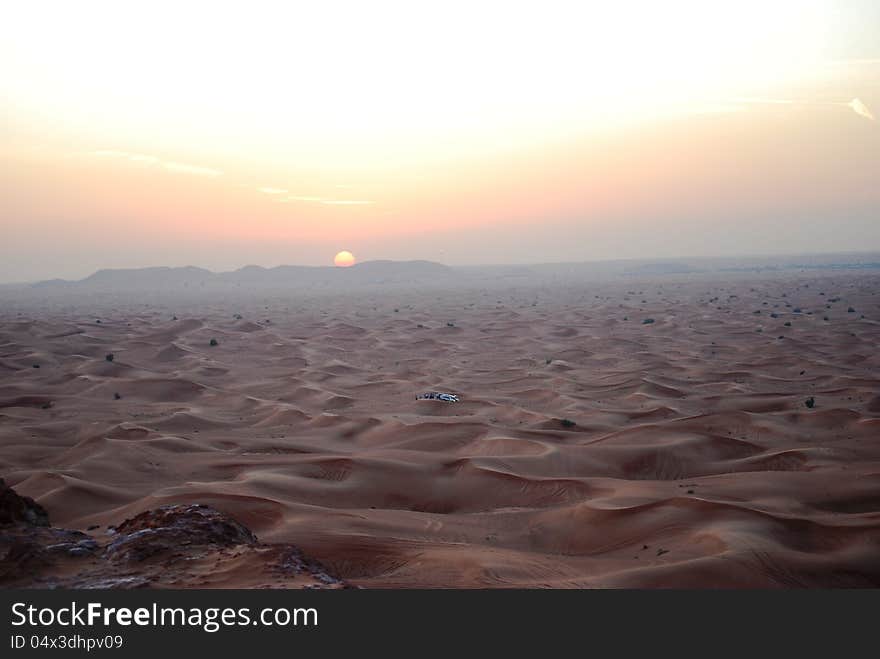 Sunset over sand dunes