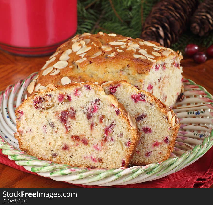 Sliced cranberry and nut bread on a plate. Sliced cranberry and nut bread on a plate