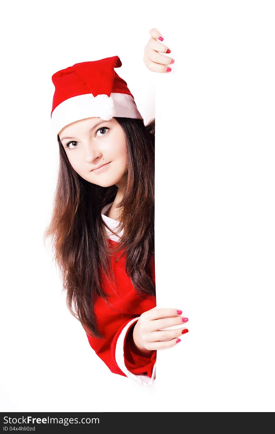 Pretty young girl dressed as Santa with a sign isolated