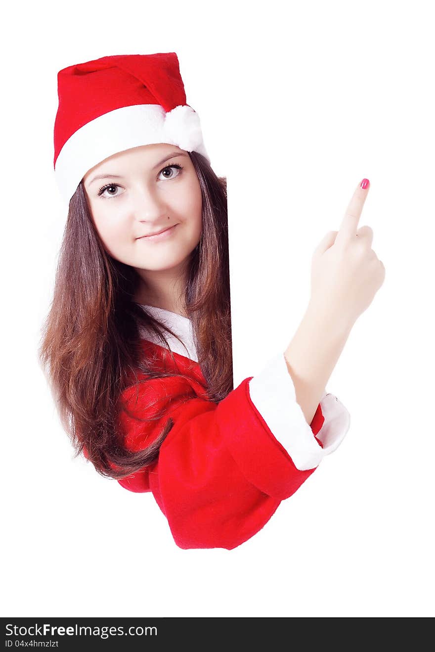 Pretty teen girl dressed as Santa with a sign isolated