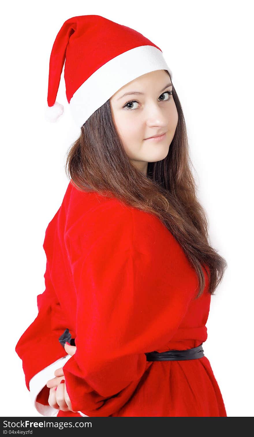 Pretty young girl turned around dressed as Santa isolated