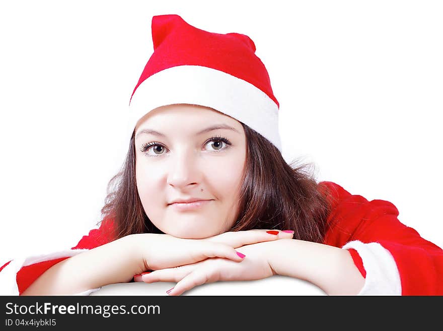 pretty girl posing dressed as Santa Claus