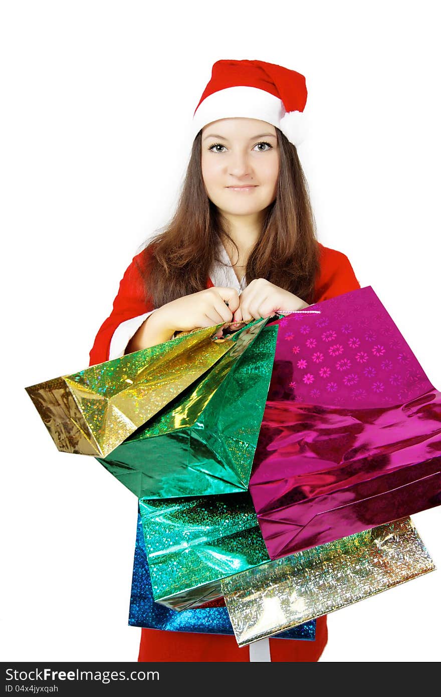 Pretty teen lady dressed as Santa with presents