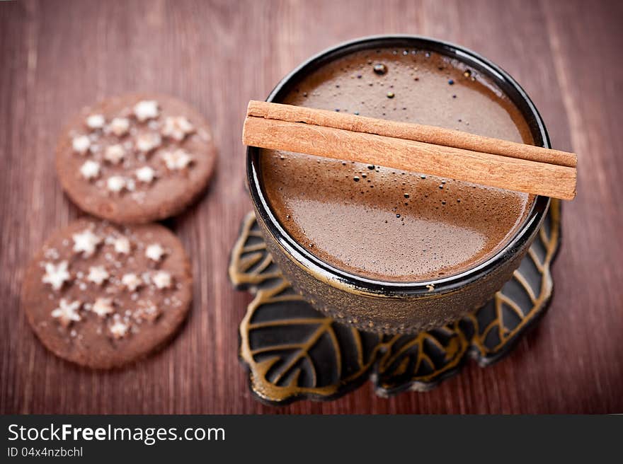 Cup of delicious coffee and chocolate chip cookies