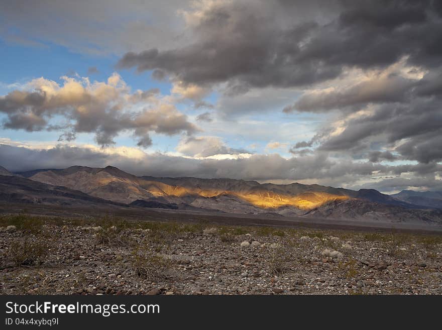 Image of dramatic sky and mountain range in Death Valley National Park, California. Image of dramatic sky and mountain range in Death Valley National Park, California.