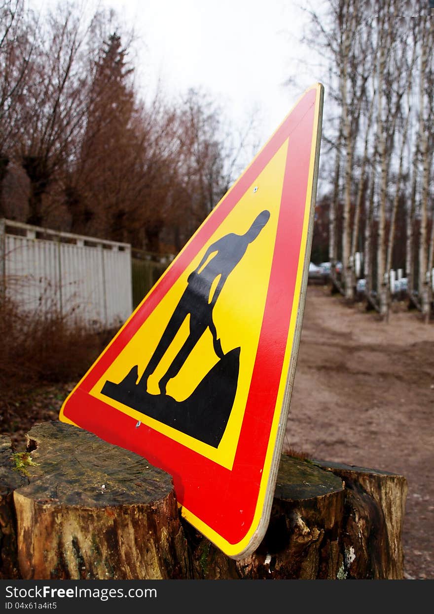 Warning sign, triangle, construction work, road being constructed. Warning sign, triangle, construction work, road being constructed