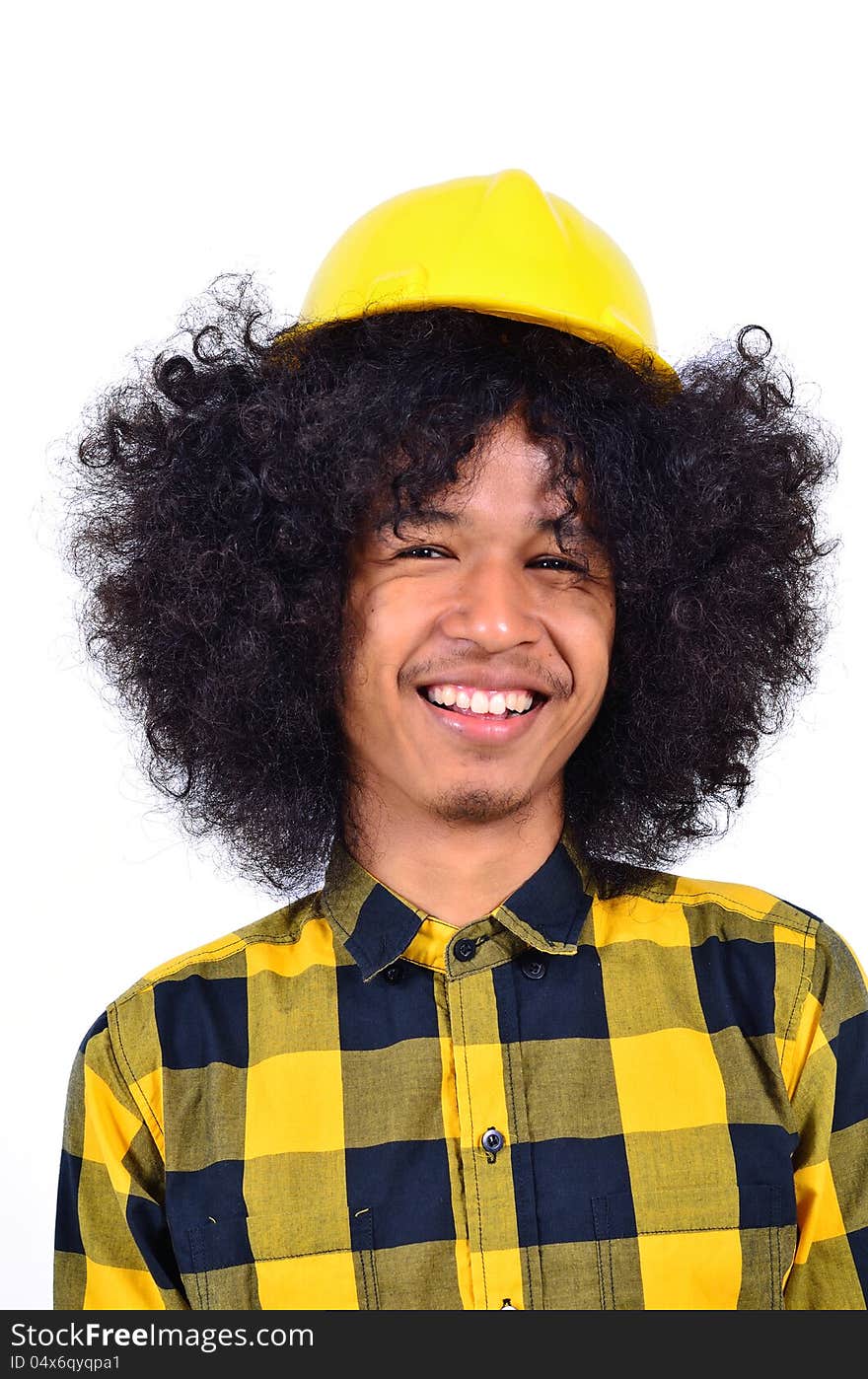 Young man with long hair and helmet as safety first concept