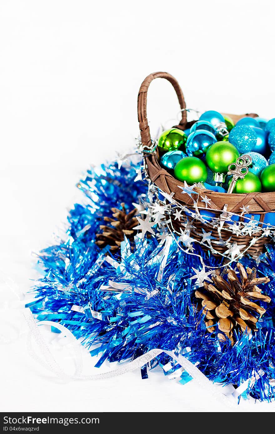 Christmas decoration with different balls and tinsel on white background