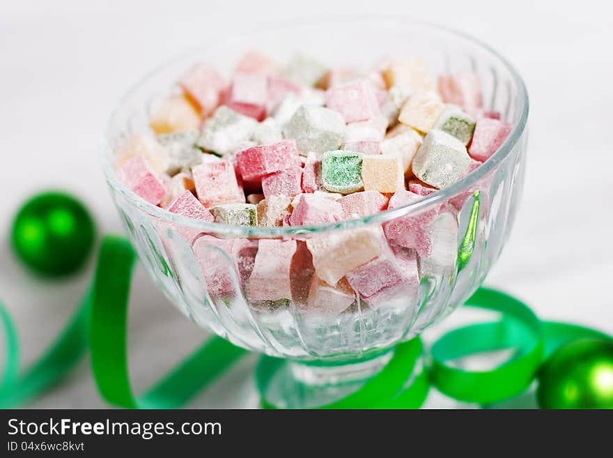 Christmas turkish delight decorated with green ribbon