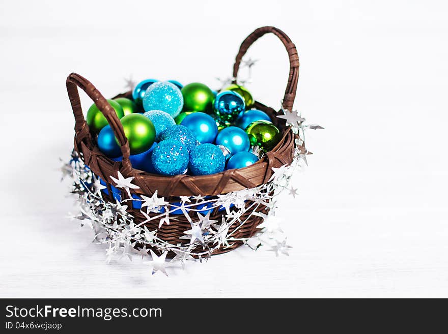 Christmas decoration with different balls and tinsel on white background