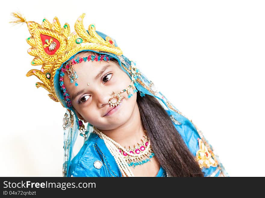 Girl Krishna : indian little girl with flute and makeup like Lord Krishna