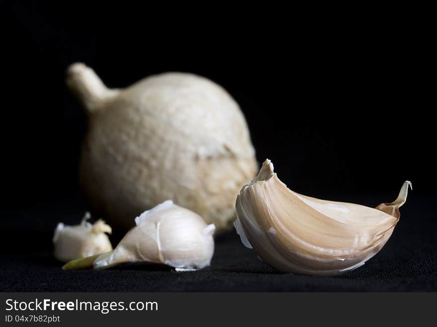 Garlic on black background