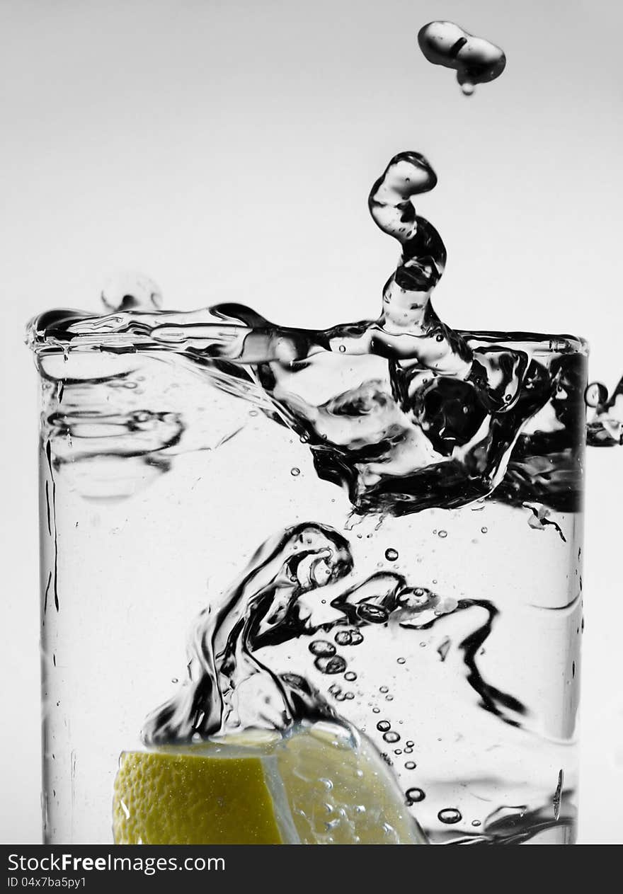 Splash in glass of water