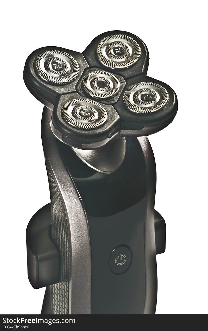 The upper part of the electric shaver, clearly visible five cutting blades circular. The upper part of the electric shaver, clearly visible five cutting blades circular