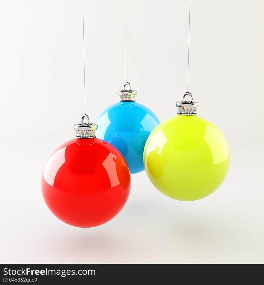 Red blue green Christmas balls hanging over white background