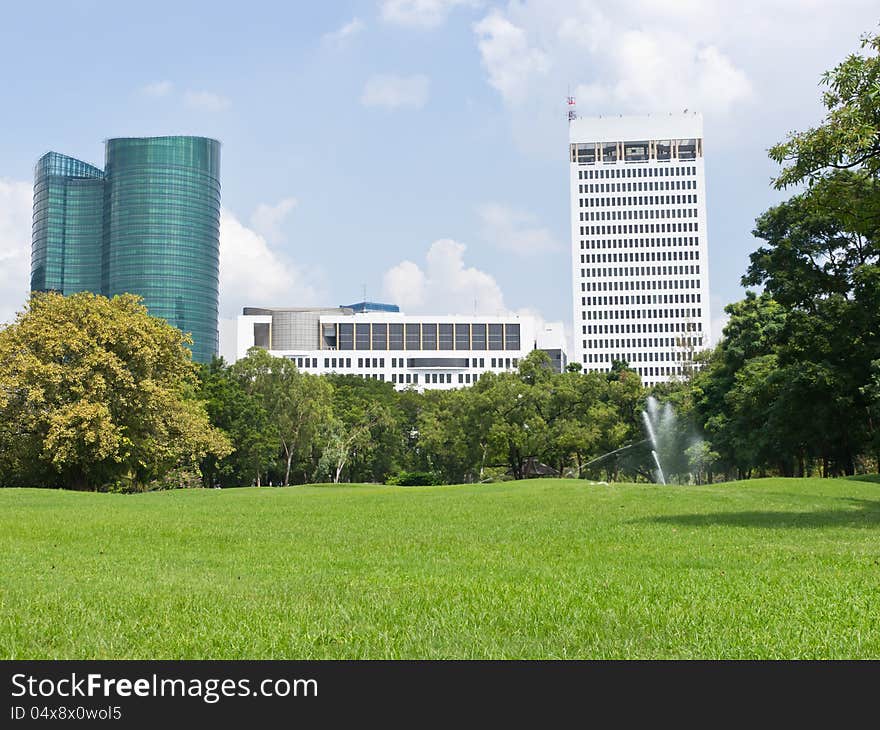 Green field in public park in bangkok