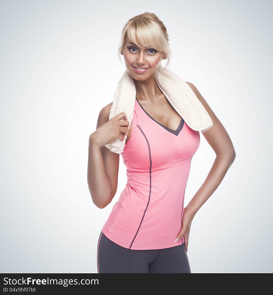 Fitness woman portrait on blue gradient background