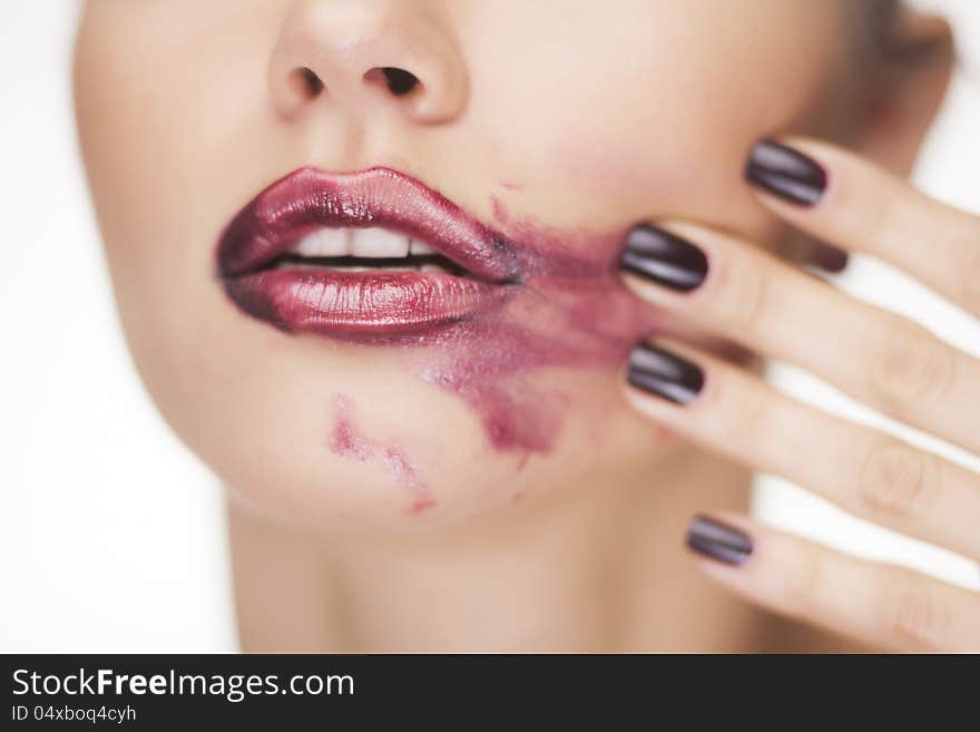 Glamour Red gloss lips closeup studio shoot