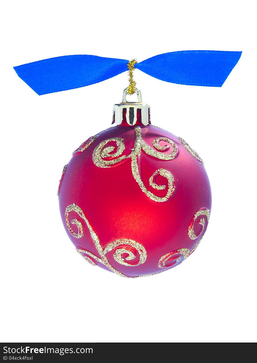 Christmas decoration, ball of red color with the dark blue ribbon, isolated on a white background. On a ball a tracery from spangles. Christmas decoration, ball of red color with the dark blue ribbon, isolated on a white background. On a ball a tracery from spangles.