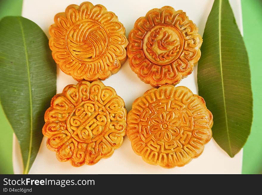 Chinese traditional moon cake in plate. Chinese traditional moon cake in plate