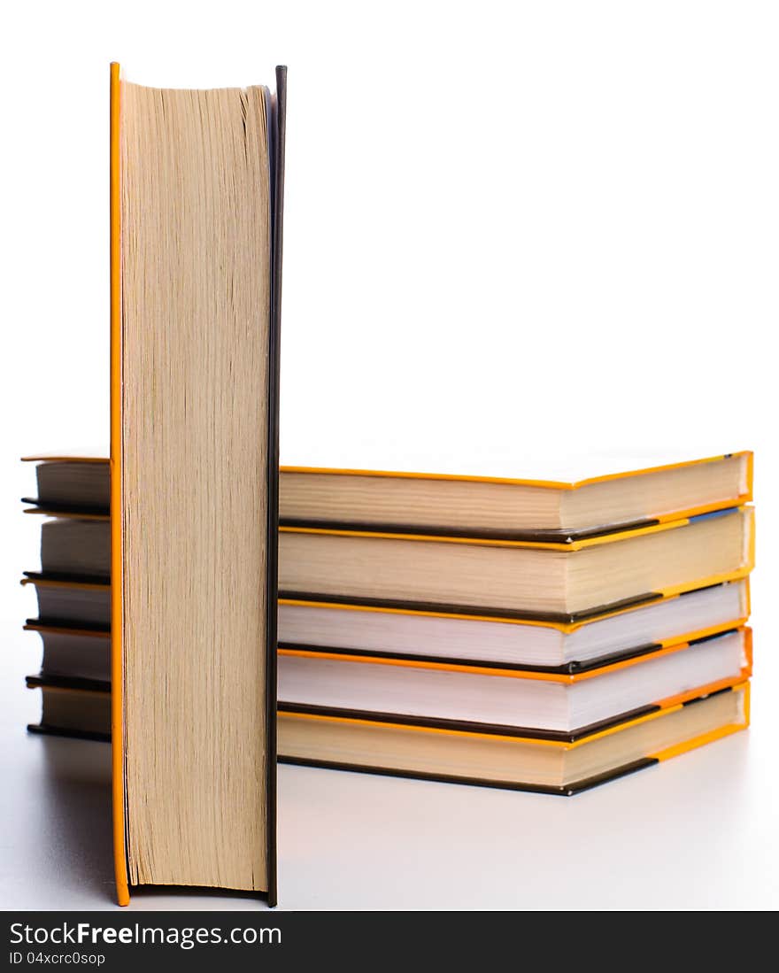 Big stack of yellow books  on white background. Big stack of yellow books  on white background