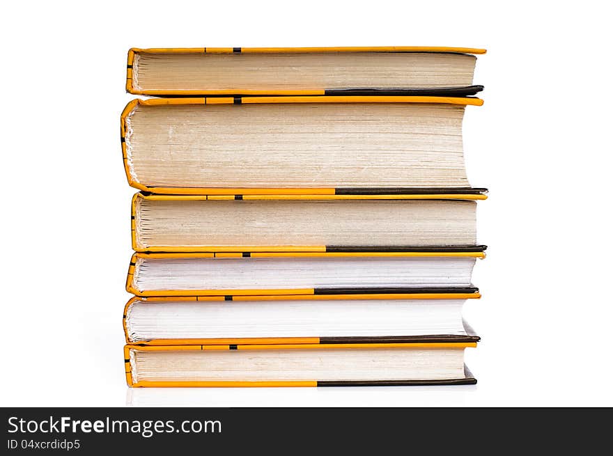 Big stack of yellow books  on white background. Big stack of yellow books  on white background