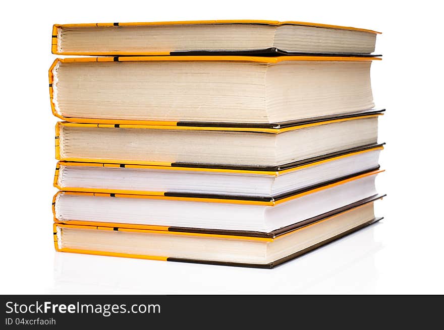 Big stack of yellow books  on white background. Big stack of yellow books  on white background