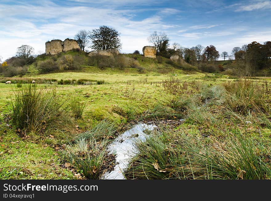 Mitford Castle with stream