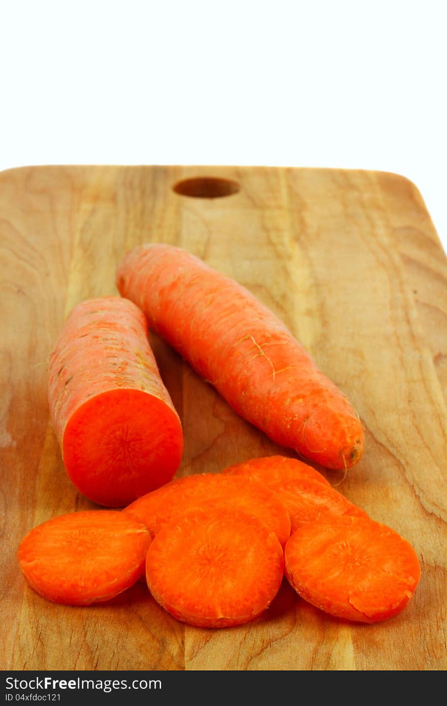 Carrots on wooden board