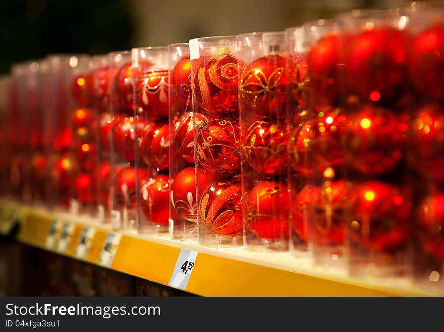 Sale of red christmas baubles