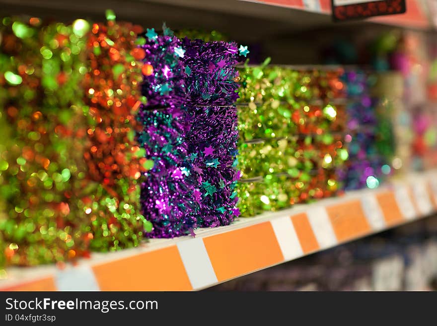 Line of different xmas decor on shelfs in hypermarket. Line of different xmas decor on shelfs in hypermarket